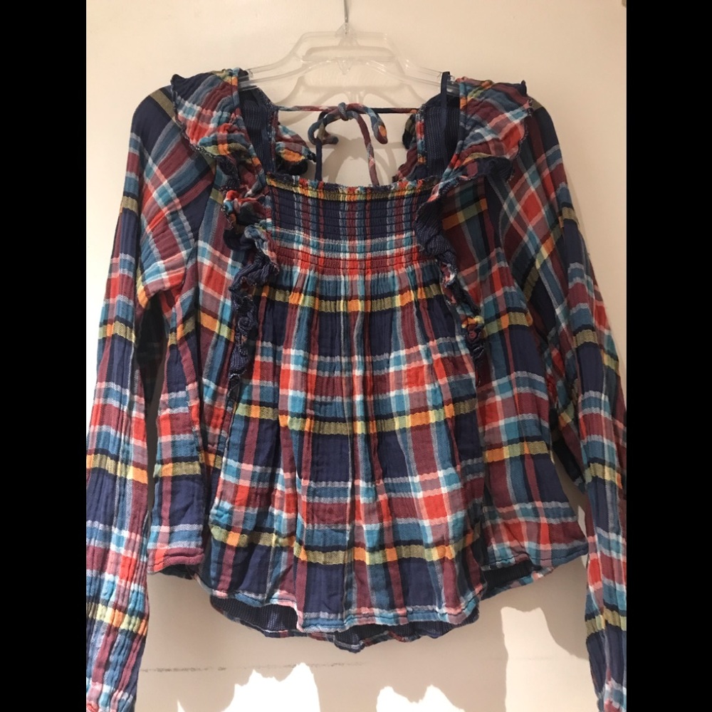 Long sleeve Free People flannel shirt.